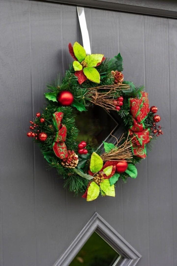 christmas-wreath-red-baubles-berries-poinsettia