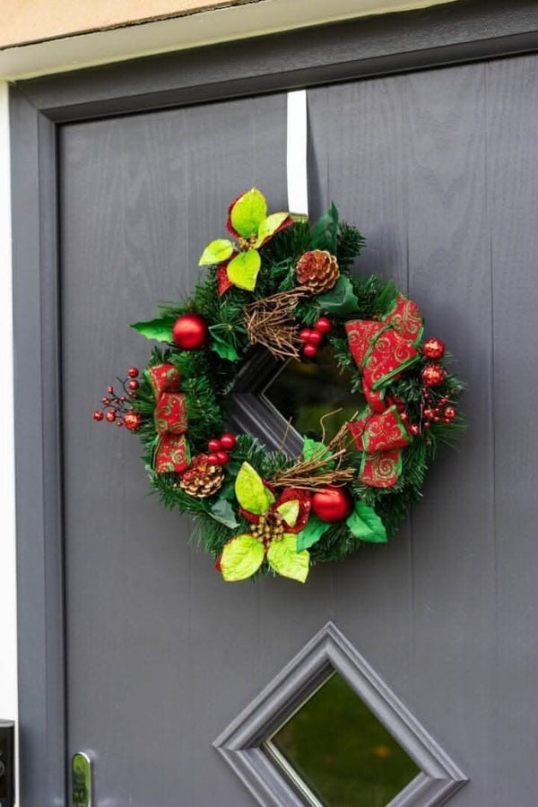 christmas-wreath-red-baubles-berries-poinsettia