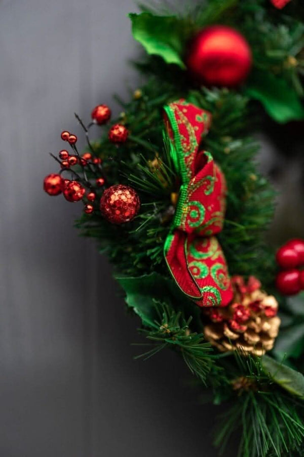 christmas-wreath-red-baubles-berries-poinsettia