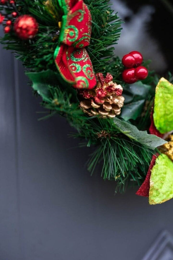 christmas-wreath-red-baubles-berries-poinsettia